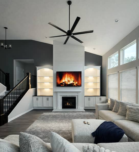 custom fireplace remodel with built-in shelving and dark accent wall in Columbus, Ohio home