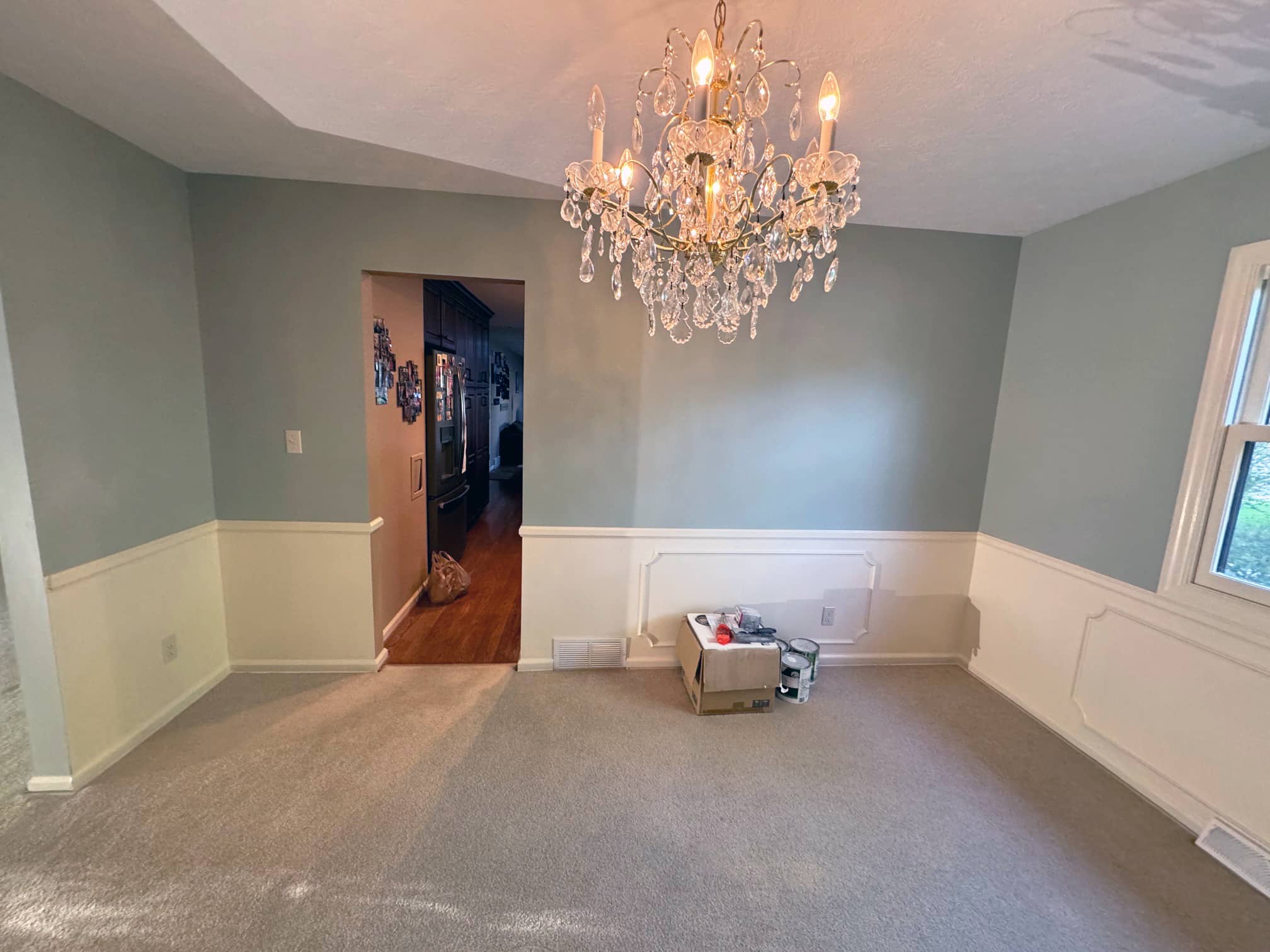 Interior room with chandelier and carpeted flooring in a Worthington, OH area home