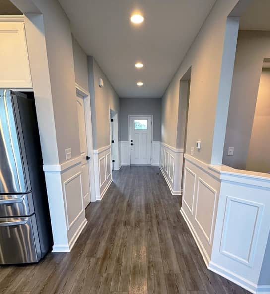 interior hallway with custom wainscoting panels and fresh gray paint in Worthington, Ohio