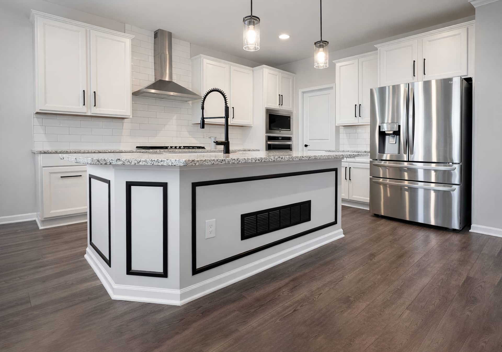 modern kitchen remodel with white shaker cabinets and granite island in Gahanna, Ohio